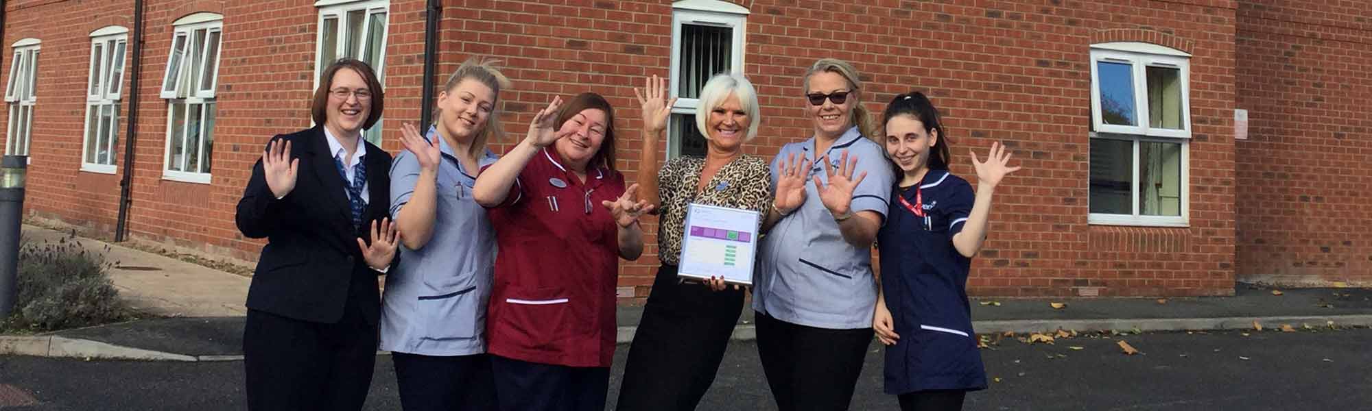 Amarna House Care Home CQC Good in all Categories team wave smiles