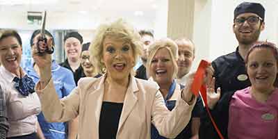 Sherrie Hewson Birchmere Mews celebrity visit staff ribbon clapping celebrating