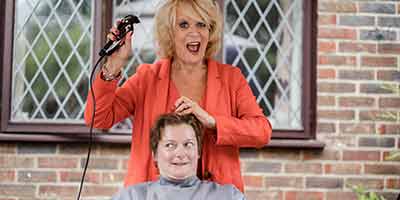 Sherrie Hewson shaves Helen Rookes head for Macmillan