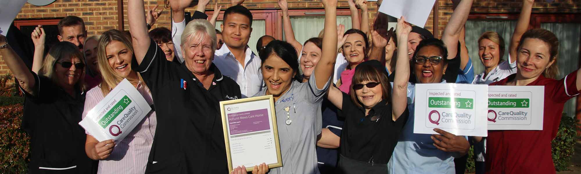 Rex and team at Ashurst Mews celebrate CQC Outstanding banner hero