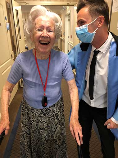 Resident-with-carer-wearing-PPE